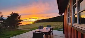 Strandstua Solbakken Feriehus - Grønningen