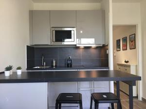 Appartements Le Petit Debrousse, Confort calme et Parking : photos des chambres