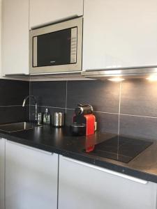 Appartements Le Petit Debrousse, Confort calme et Parking : photos des chambres