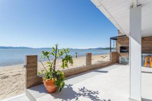 Casa pé na areia SC