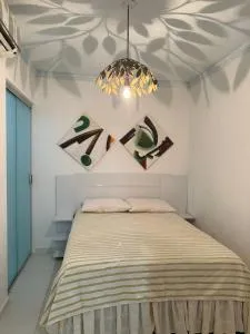 Suíte Sol e Lua Guriri - Conforto a 80m da Praia de Guriri - Mariricu