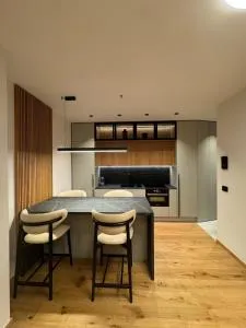 F Apartments - Tabla