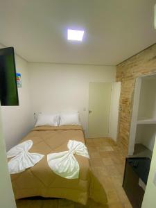 Frente ao Mar - Suites com Piscina Aquecida, SPA Privativo, Vista ao Mar ou Montanha, com Estacionamento- Raizes do Mar ECO Hotel