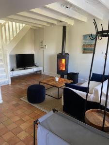 Maisons de vacances La Petite Maison, jardin et jacuzzi, proche de Lyon : photos des chambres