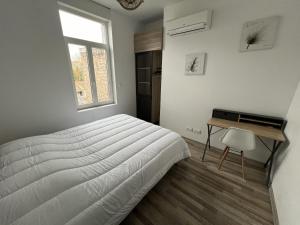 Appartements Amiens, appart douillet 2-4P : photos des chambres