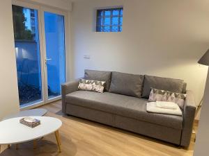 Appartement neuf et cozy avec place de parking