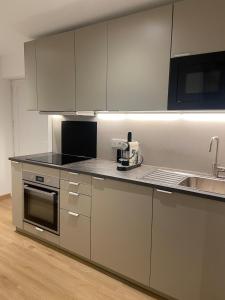 Appartement neuf et cozy avec place de parking