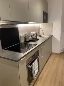 Appartement neuf et cozy avec place de parking