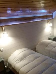 Chalets Joli chalet dans la foret : photos des chambres