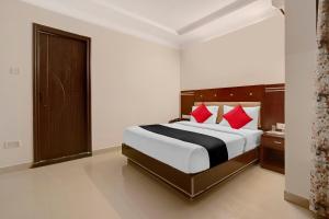 Capital O Elegant Amethyst Business Hotel Near Ragigudda Sri Prasanna Anjaneyaswamy Temple