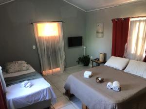 Casa Privativa em Arraial dAjuda - 1 Quarto com 2 camas, Cozinha e Banheiro - 10 Minutos do Centro - Sem Estacionamento