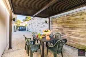 Villas Biscarrosse Bourg, jolie petite maison pour 4 personnes avec Terrasse et jardin : photos des chambres