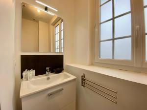 Appartements Henry II - Petit appartement lumineux - 013 : photos des chambres