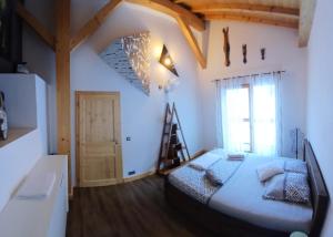 Sejours chez l'habitant Chalet les Vagnys - Lac des Vernays : photos des chambres