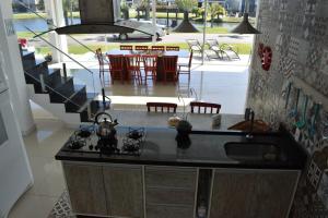 Casa com 5 suítes e piscina em condomínio Dubai