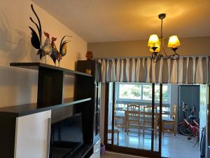 Apartamento bajo el gallo