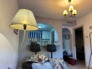 Apartamento bajo el gallo