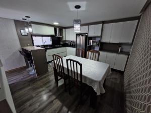 Residência Avila 1 - Ipê Branco