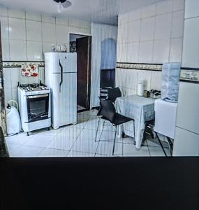 Casa no Condomínio Bosque do Per Proximo a Praia