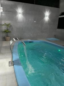 Casa com piscina para 12 pessoas