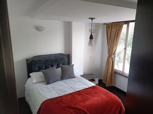 Cómoda habitación privada con baño compartido