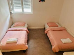 Sejours chez l'habitant Maison de vacances aux portes de Paris : Chambre Lits Jumeaux