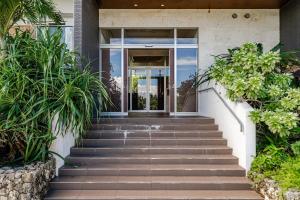 You can enter the beach by swimwear from the room