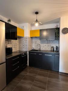 Appartements Appartement moderne et lumineux : photos des chambres