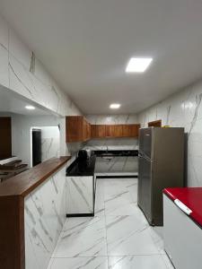 Duplex com quatro suítes
