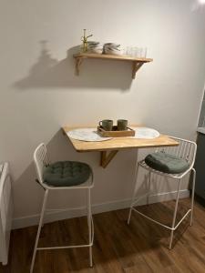 Appartements La Suite Emeraude - Cosy, chic et bord de mer : photos des chambres