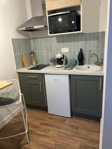 Appartements La Suite Emeraude - Cosy, chic et bord de mer : photos des chambres