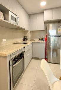 Loft with balcony and garage minutes away from corporate axis