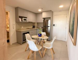 Loft with balcony and garage minutes away from corporate axis