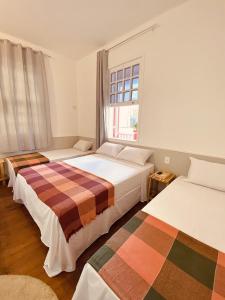 Pousada Flores do Farol