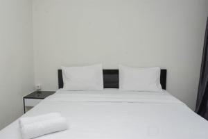 Comfy and Tidy Studio Amethyst Apartment By Travelio