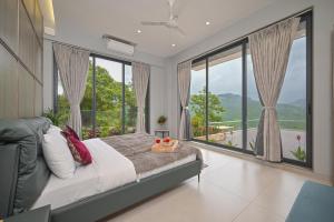 SaffronStays Lords Pavilion - 6BR Luxury Villa with Lawn & Cricket Turf near Pawna