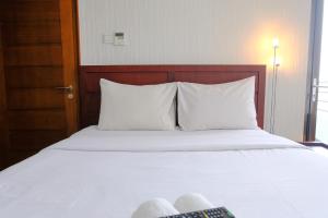 Spacious Designed 2BR Dago Butik Apartment By Travelio