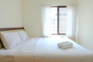Scenic 2BR at Grand Setiabudi Apartment By Travelio