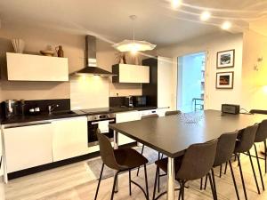 Appartements LUMIERE- Appartement Design et Elegant : photos des chambres