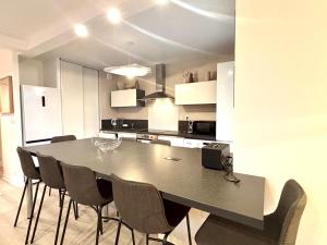 Appartements LUMIERE- Appartement Design et Elegant : photos des chambres
