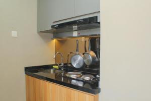 Wonderful 1BR Apartment at Mustika Golf Residence By Travelio