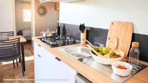 Campings Domaine Residentiel de Plein Air Les Dunes : photos des chambres