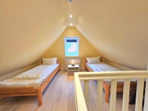 Ferienhaus am Dorfteich 16a OG