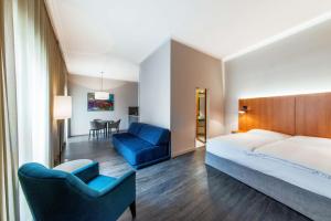 Family Room (2 Adults + 1 Child) room in NH Prague City