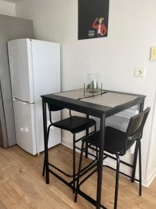 Appartements Studio cosy avec borne de recharge : photos des chambres