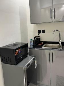 شقة فندقية غرفة وصالة بأثاث أنيق Rathath hotel apartment