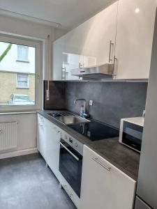 City Apartments Essen for up to 6 person with 4K TV and kitchen