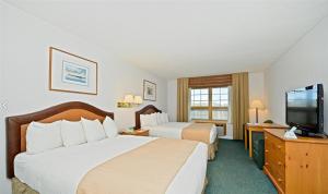 Queen Room with Two Queen Beds and Sofa Bed - Non Smoking room in Best Western Sault Ste. Marie
