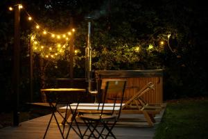 Maisons de vacances Lodge 5 etoiles - Home Chic dans les pres : photos des chambres