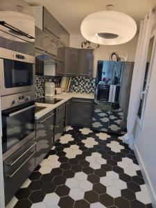 Chambre cosy près de Paris dans un appartement partagé